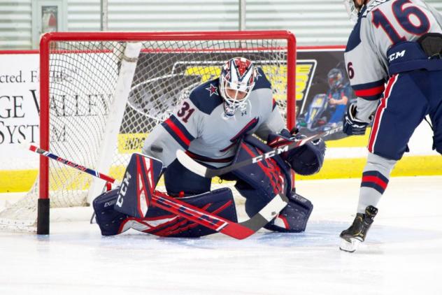 Goaltender Justin Kapelmaster with Robert Morris University
