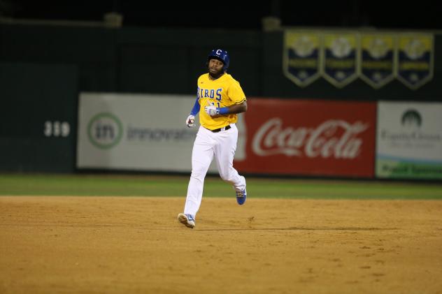 Jabari Henry of the Sioux Falls Canaries rounds the bases following his home run