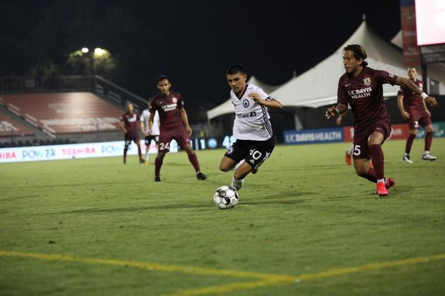 Ray Serrano of Tacoma Defiance navigates against Sacramento Republic FC