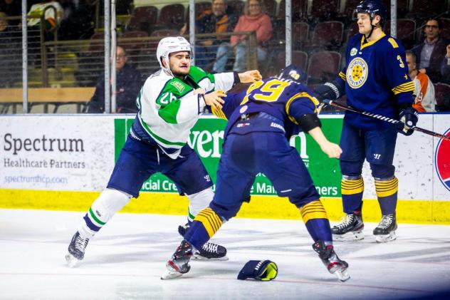 Maine Mariners forward Mikael Robidoux (left) mixes it up vs. the Norfolk Admirals