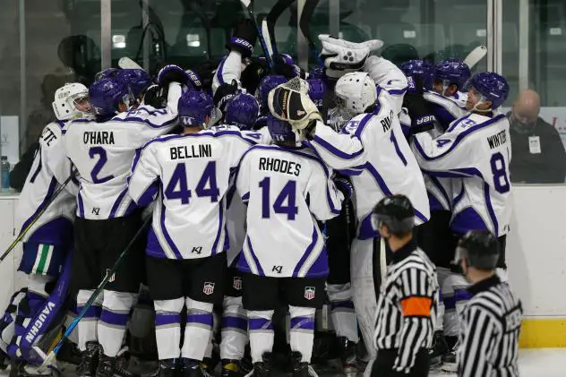 The Tri-City Storm celebrates their overtime win against the Omaha Lancers