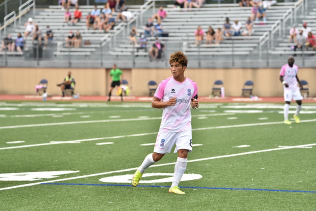 Forward Madison MVP midfielder Michael Vang