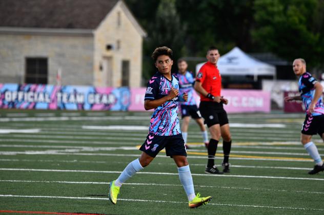 Forward Madison MVP midfielder Michael Vang
