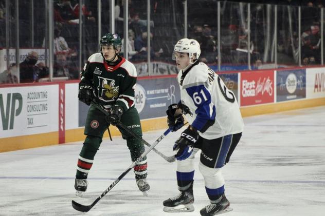 Saint John Sea Dogs centre Cam McDonald (right) vs. the Halifax Mooseheads