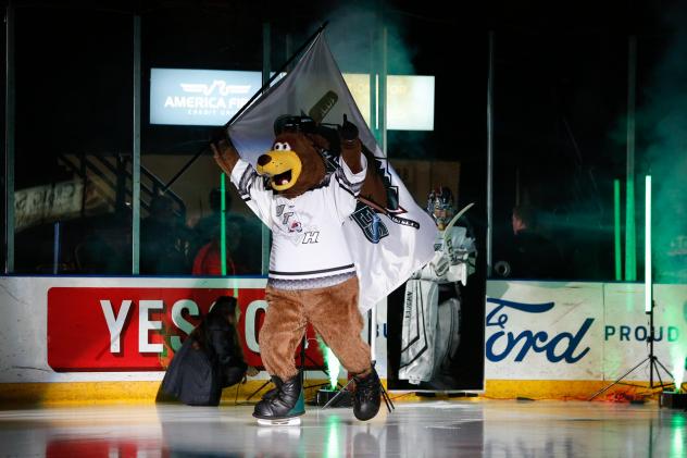 Utah Grizzlies mascot Grizzbee leads the team on to the ice