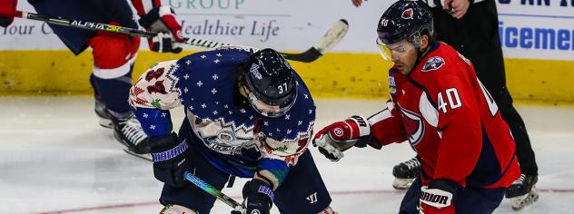 South Carolina Stingrays forward Caleb Herbert (right) vs. the Jacksonville IceMen