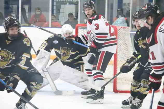 Aberdeen Wings forward Liam Fraser in front of the Bismarck Bobcats goal