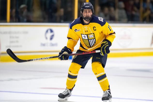 Forward Tyler Irvine with Merrimack College