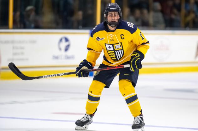 Forward Tyler Irvine with Merrimack College