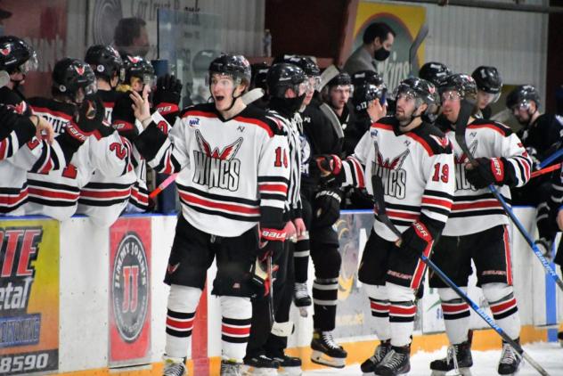 Aberdeen Wings exchange congratulations along the bench