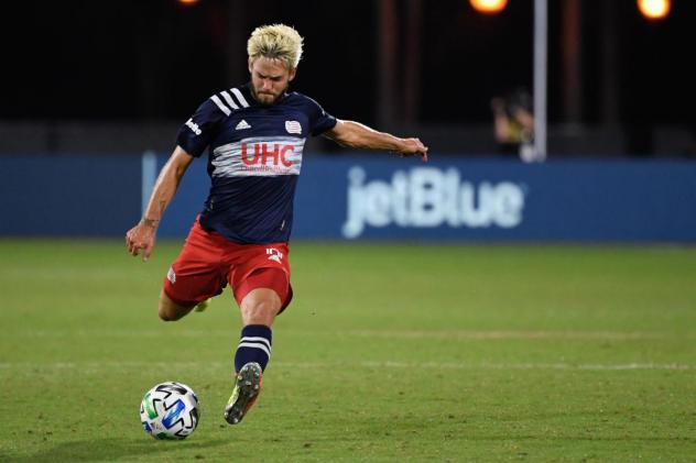 Midfielder Kelyn Rowe with the New England Revolution