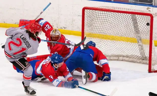 Jake LaRusso of the New Jersey Titams scores against the Maine Nordiques