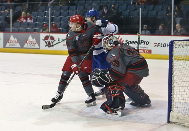 Defenseman Les Lancater and goaltender Justin Kaplemaster of the Allen Americans