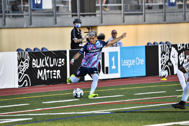 Forward Madison FC defender Christian Diaz