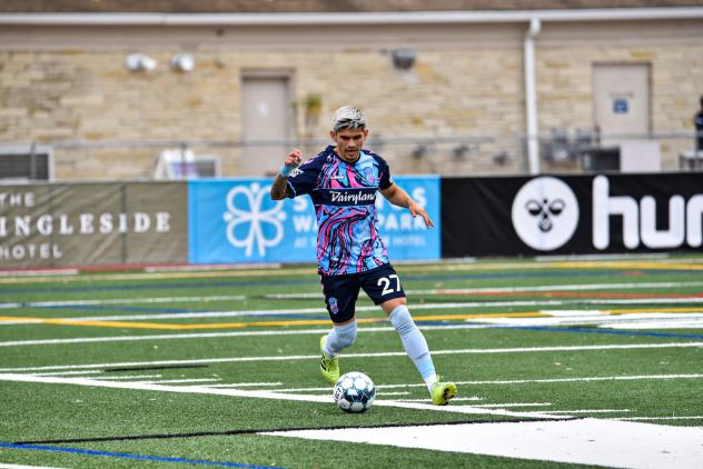 Forward Madison FC defender Christian Diaz