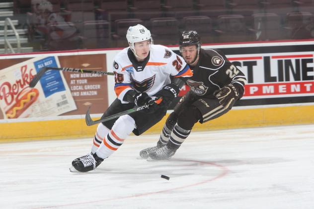 Lehigh Valley Phantoms defenseman Wyatte Wylie (left) vs. the Hershey Bears