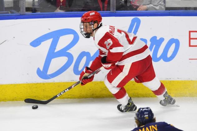 Forward Austin McILmurray with Sacred Heart University