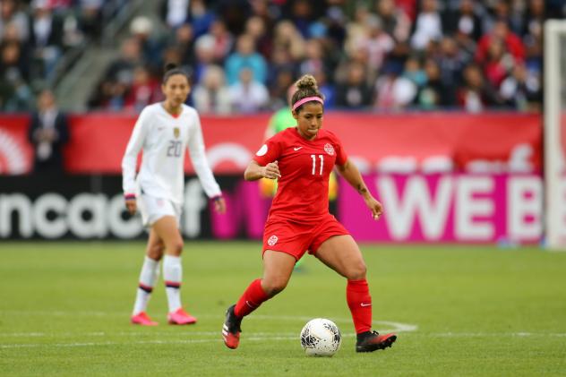 Midfielder Desiree Scott