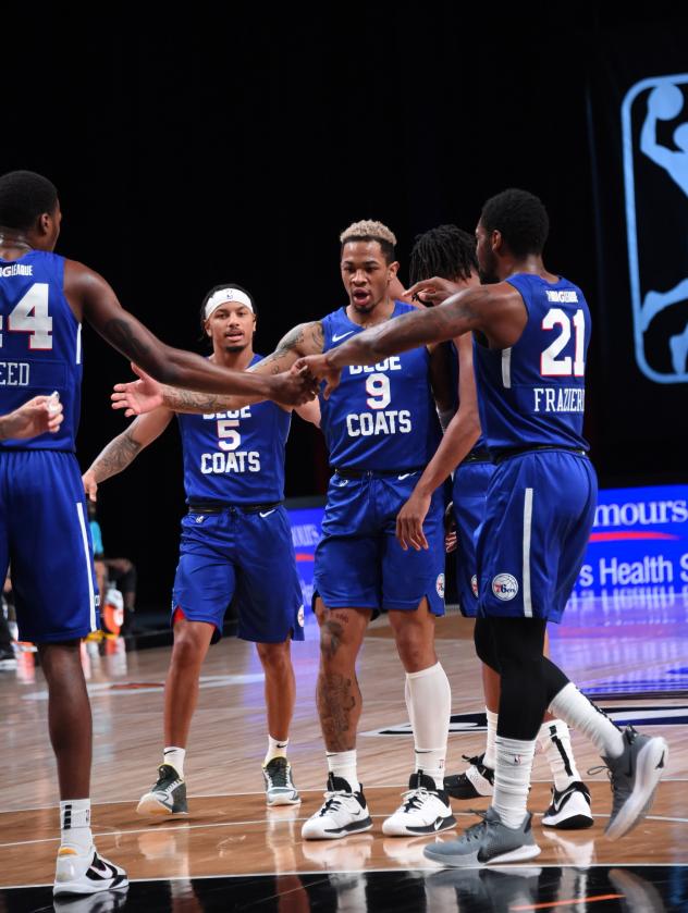 Delaware Blue Coats exchange congratulations