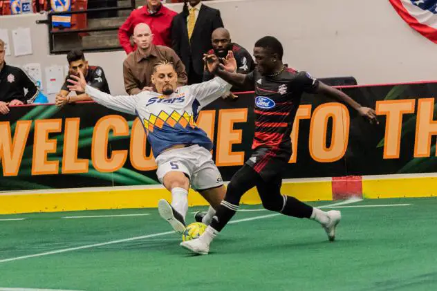 Tacoma Stars' Adriano Dos Santos (left) goes for a tackle in the first half of Tacoma's 9-5 loss to the Ontario Fury