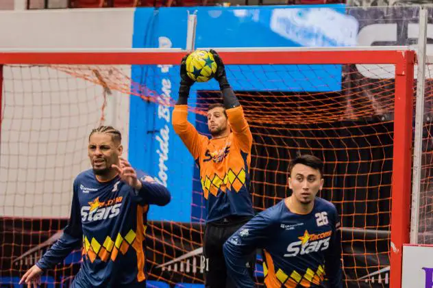 Tacoma Stars goalkeeper Chris Toth goes high for a save against the San Diego Sockers