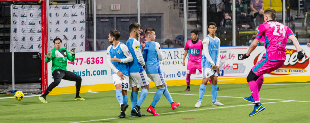 St. Louis Ambush defender Stefan Mijatovic (right) fires a shot past the San Diego Sockers