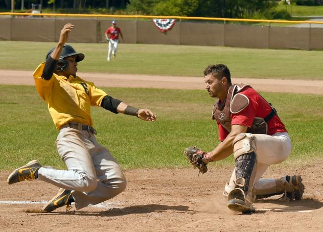 Catcher Tyler Hill prepares to make a tag
