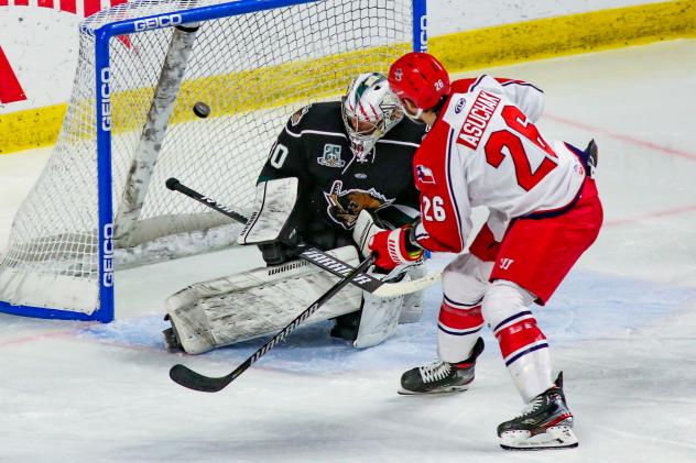 Allen Americans forward Spencer Asuchak scores on a penalty shot against the Utah Grizzlies