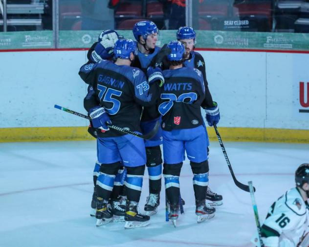 Wichita Thunder huddle after a goal