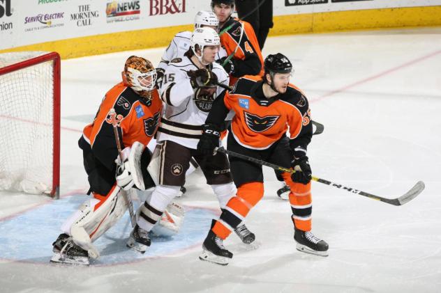 Lehigh Valley Phantoms defenseman Samuel Morin (right) vs. the Hershey Bears