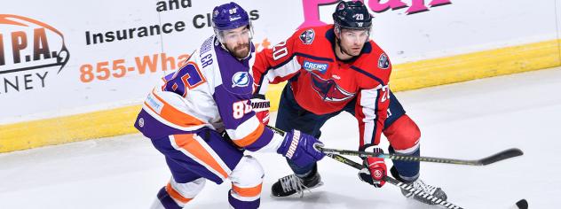 South Carolina Stingrays defenseman Casey Johnson (right) vs. the Orlando Solar Bears