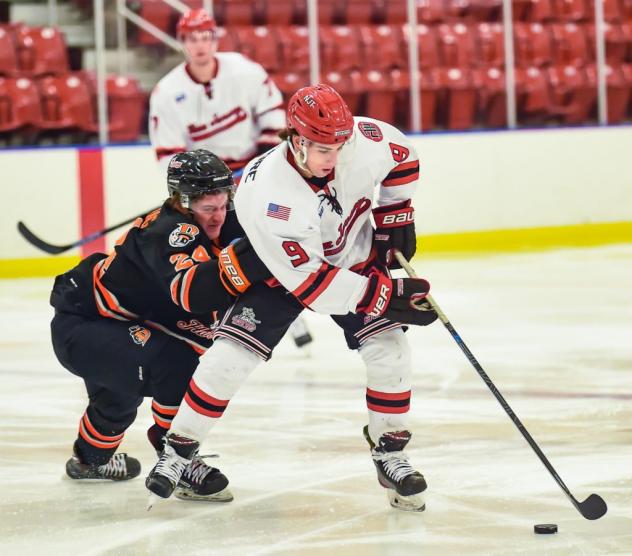 New Jersey Titans forward Anthony Calafiore (right) vs. the Danbury Jr. Hat Tricks