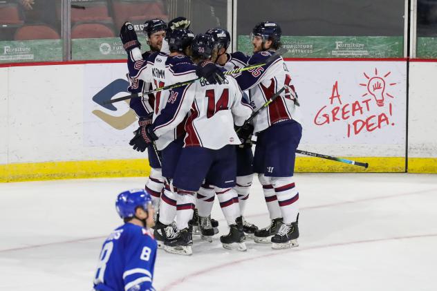Tulsa Oilers celebrate their overtime goal