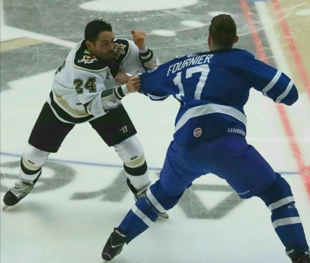 Wheeling Nailers forward Garet Hunt (left) squares off with Wichita Thunder forward Stefan Fournier