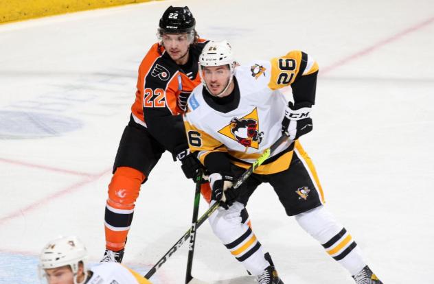 Lehigh Valley Phantoms defenseman Logan Day (left)