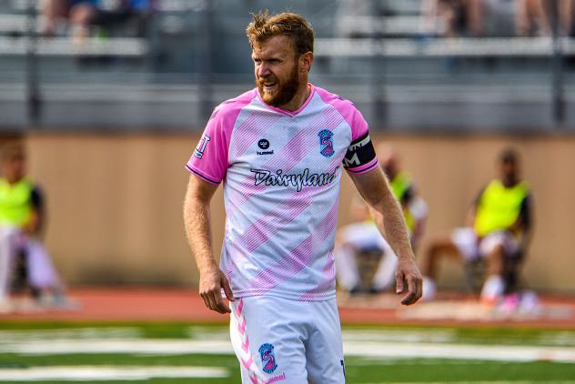 Forward Madison FC defender Connor Tobin