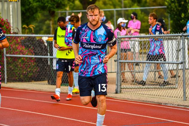 Forward Madison FC defender Connor Tobin