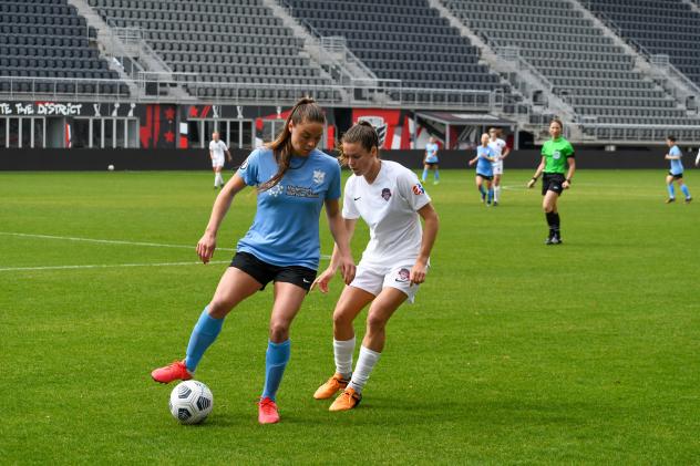 Erica Skroski of Sky Blue FC (left) and Kelley O'Hara of the Washington Spirit