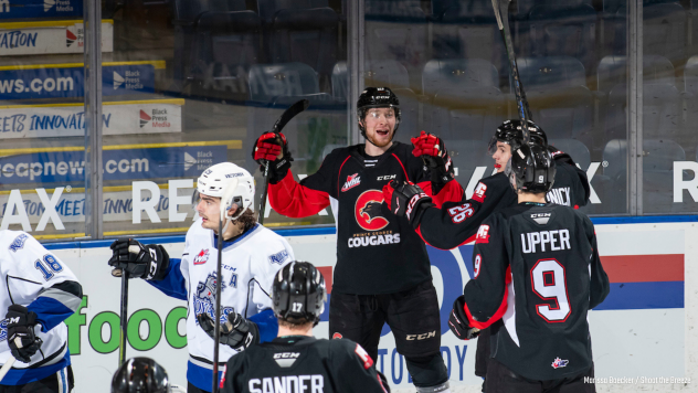Prince George Cougars react after a goal against the Victoria Royals