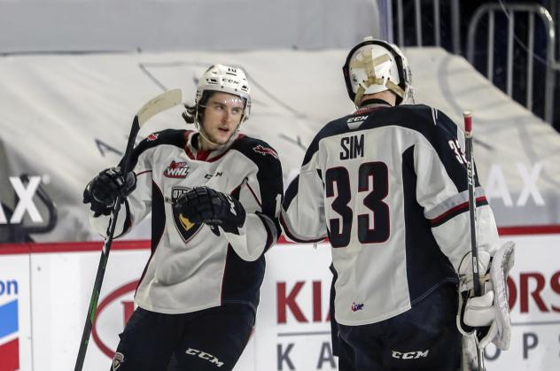 Vancouver Giants left wing left wing Zack Ostapchuk and goaltender Drew Sim vs. the Victoria Royals