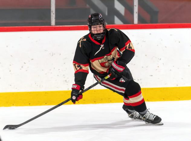 Forward Brendan Dumas with St. Sebastian's School