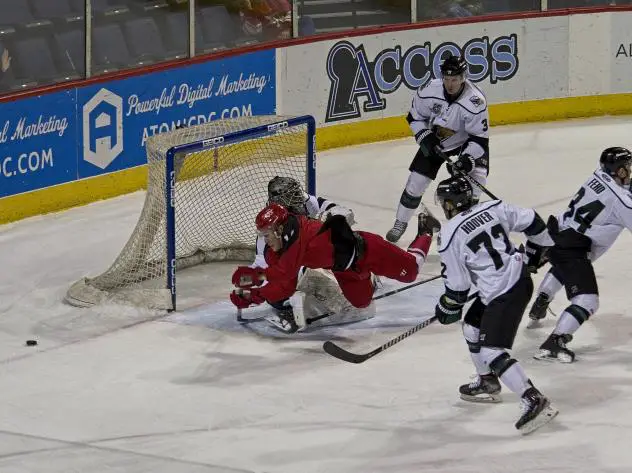 Allen Americans defenseman Les Lancaster in the middle of the Utah Grizzlies defense