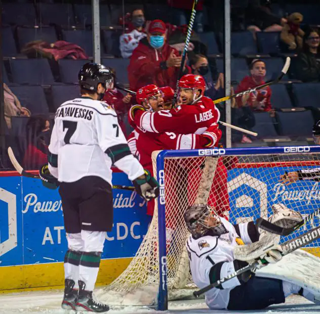 Allen Americans celebrate a goal against the Utah Grizzlies