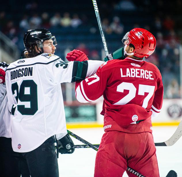 Utah Grizzlies forward Hayden Hodgson and Allen Americans forward Samuel Laberge exchange pleasantries