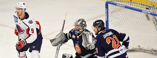 South Carolina Stingrays forward Justin Florek (left) vs. the Greenville Swamp Rabbits