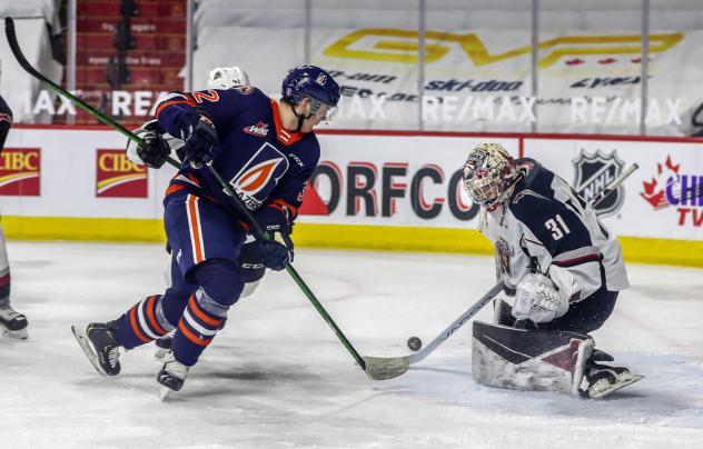 Vancouver Giants goaltender Trent Miner makes a stop against the Kamloops Blazers