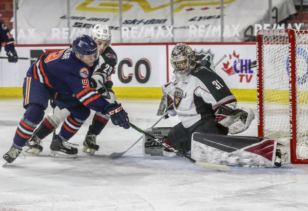 Vancouver Giants goaltender Trent Miner stops the Kamloops Blazers