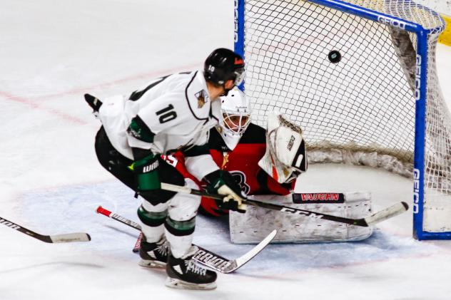 Utah Grizzlies forward Ty Lewis scores against the Rapid City Rush