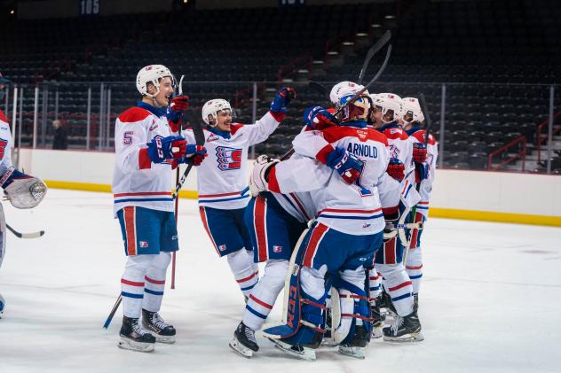 Spokane Chiefs celebrate a win