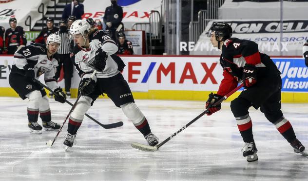 Vancouver Giants right wing Justin Lies vs. the Prince George Cougars